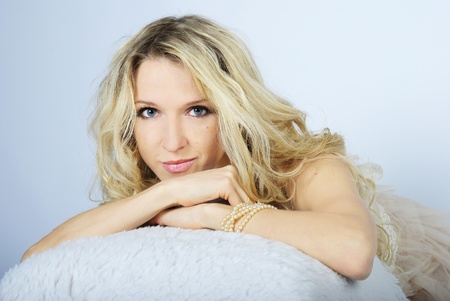 portrait of the young beautiful girl of the blonde with long hairの写真素材