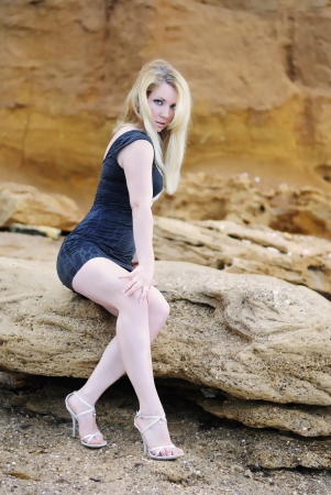 Beautiful blonde in short gown near clay captive
の写真素材