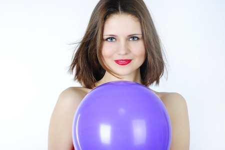 young beautiful girl with red pomade with long hair with air ball
の写真素材