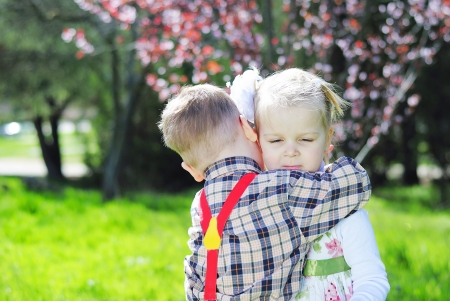 couple in love little kids for a walk in the park
の写真素材