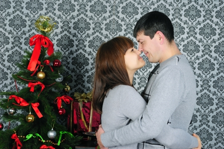 young couple in love near new year's fir tree
の写真素材