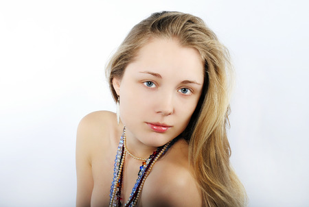 Portrait of the beautiful girl in costume jewellery の写真素材