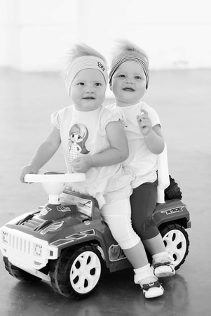 sisters twins for a walkの写真素材