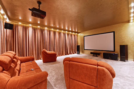 The interior of the home theater in a modern luxury home.の写真素材