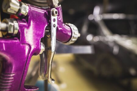 spray guns in the paint shop repair shop, close-upの写真素材