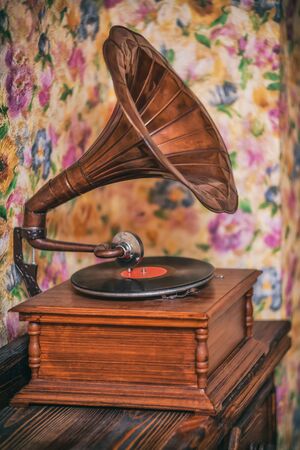 Old gramophone on the background of bright walls, selective focusの写真素材