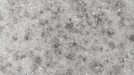 Background of soap foam bubbles in close-up, selective focus. The concept of purity