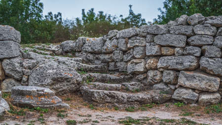 Ruins of ancient buildings. Archaeological excavations of antiquities. Natural light