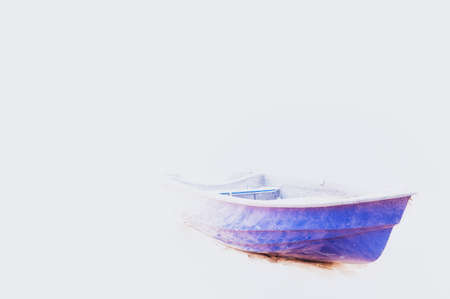 an old blue boat on a white background in perspective. Selective focus.の写真素材