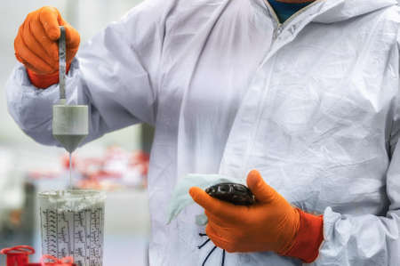 measurement of paint viscosity. Preparation of paint for application. Close-upの写真素材