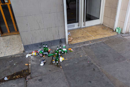 London, UK - 28 July, 2018: Dirt, garbage, empty bottles after a holiday in the city.のeditorial素材