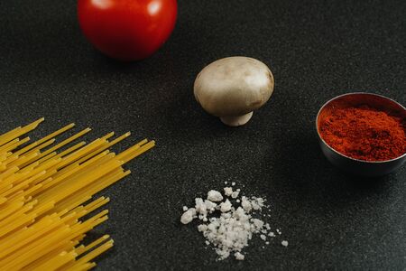 Ingredients Italian spaghetti products, vegetables and spicesの写真素材