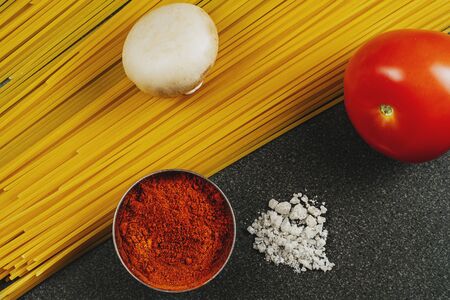 Ingredients Italian spaghetti products, vegetables and spicesの写真素材