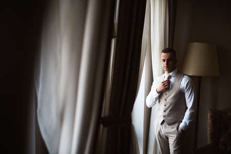 The grooms morning. Wedding begins in a hotel where newlyweds are preparing for itのeditorial素材