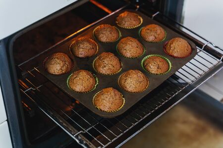 freshly baked cupcakes were taken out of the ovenの写真素材