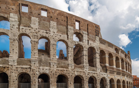 Wall amphitheater Colosseum in Rome with traces of damage