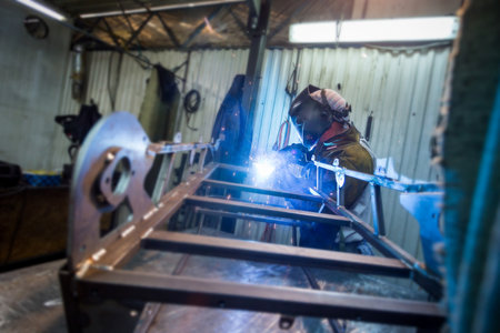 welder weld assembles metal work