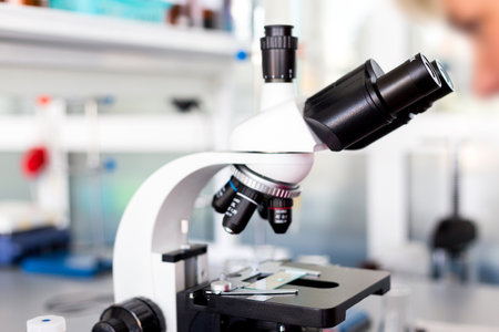 Study with a microscope in biology laboratories, scientific activity, biological microscope