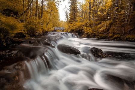 waterfall in dense forest Karelia