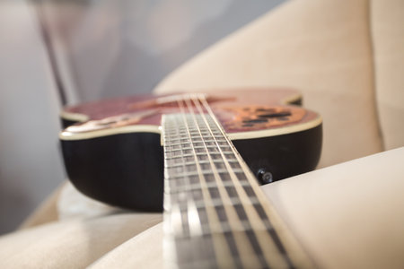 acoustic guitar fretboard close up