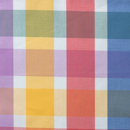Colorful checkered tablecloth background, closeup of photoの写真素材