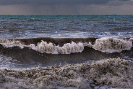 storm at sea, dramatic sky at sunset, big waves