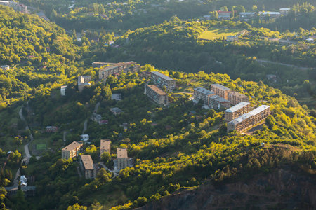 small town in the mountains view from above at sunsetの写真素材