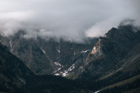 Mountains in the clouds, waterfall in the mountains of Georgia