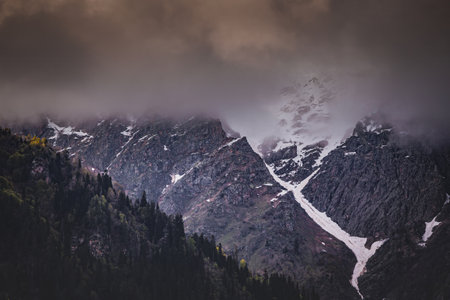 Mountains in the clouds, end of the Mazeri mountain valley in Georgia
