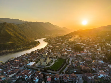 Mtskheta Church, view of the city on a sunset, aerial view, flying straightの写真素材