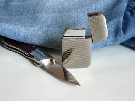 Penknife for the hidden carrying complete with a lighterの写真素材