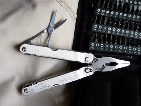 Universal work by means of the multitool の写真素材
