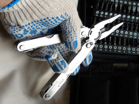 Universal work by means of the multitool の写真素材