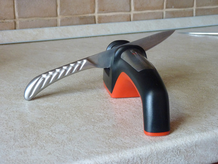 Sharpener with a knife の写真素材