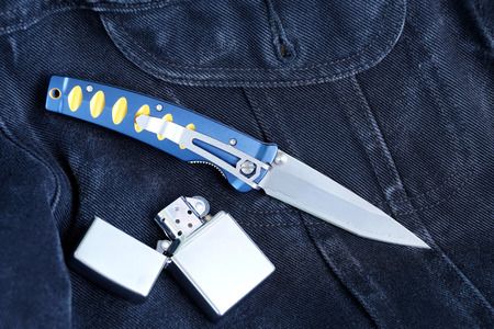 Penknife with a blade from Damask steel with a petrol lighter