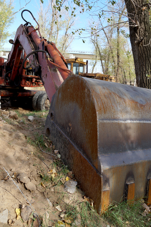 Old excavator for cleaning of large volumes of soil