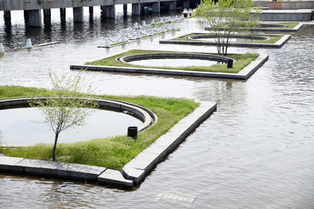Flooded part of the embankment of the big city