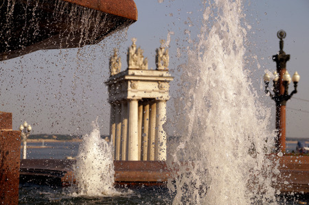 Fountain stream on the Volgograd embankment in decline beamsの写真素材