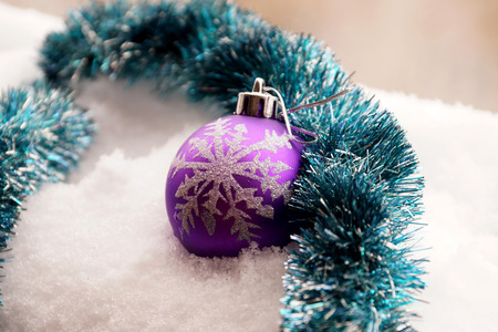 Fir-tree toy a plastic sphere with the drawn snowflakeの写真素材