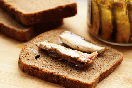Fish sprats canned food in oil in a glass jarの写真素材