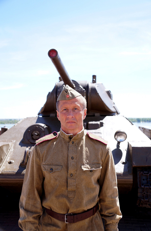 Fighter of Red Army in the form of times of World War II at the T-34 tankの写真素材