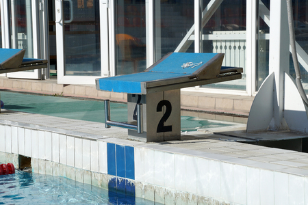 Number bedside table for the athlete's jump to the poolの写真素材