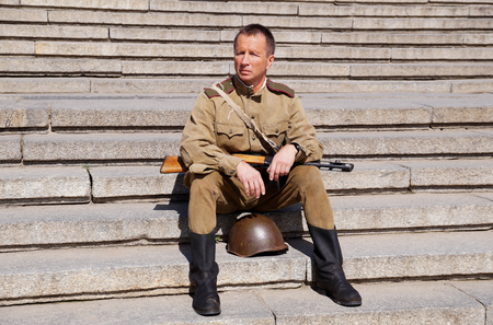 Soldier of Red Army in the form of times of World War II with the machine gunの写真素材