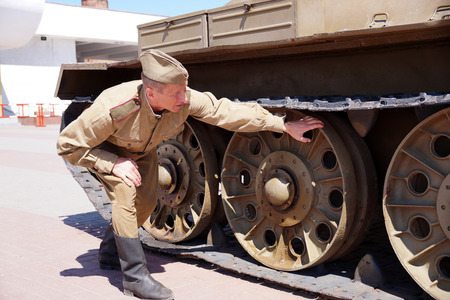 Fighter of Red Army in the form of times of World War II at the T-34 tankの写真素材
