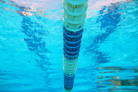 Dividers of paths in the big outdoor swimming poolの写真素材