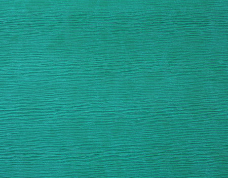 green fabric texture useful as a background, soft pastel colors.の写真素材