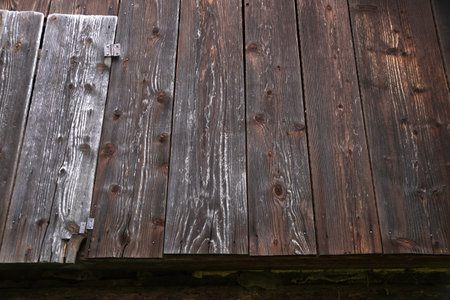 The roof of the roof of a rural house made of wooden planksの写真素材