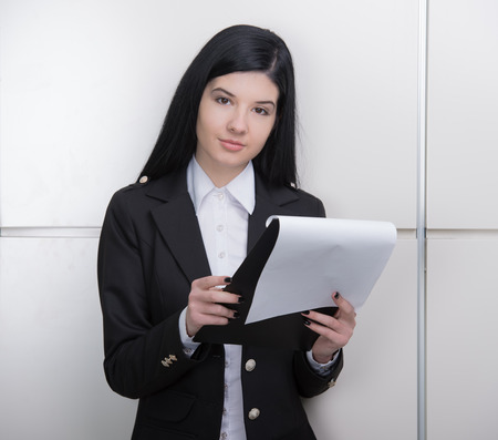 Successful business woman looking confident and smilingの写真素材