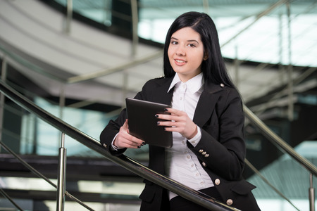 Successful business woman looking confident and smilingの写真素材