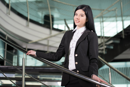 Successful business woman looking confident and smilingの写真素材